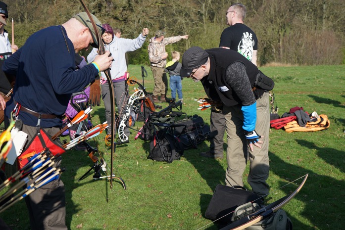 [archers getting kit ready]